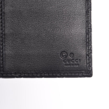 Women's Black Microguccissima Continental Flap Wallet