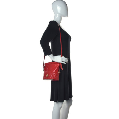 Red Leather Medusa Quilted Drawstring Bucket Bag